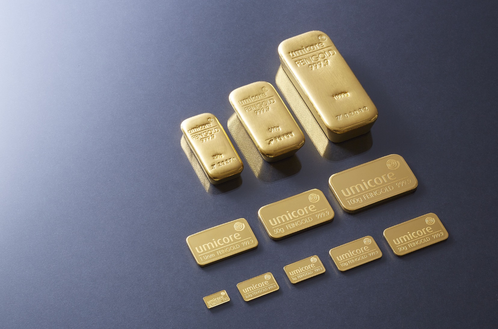 gold bars displayed in various sizes